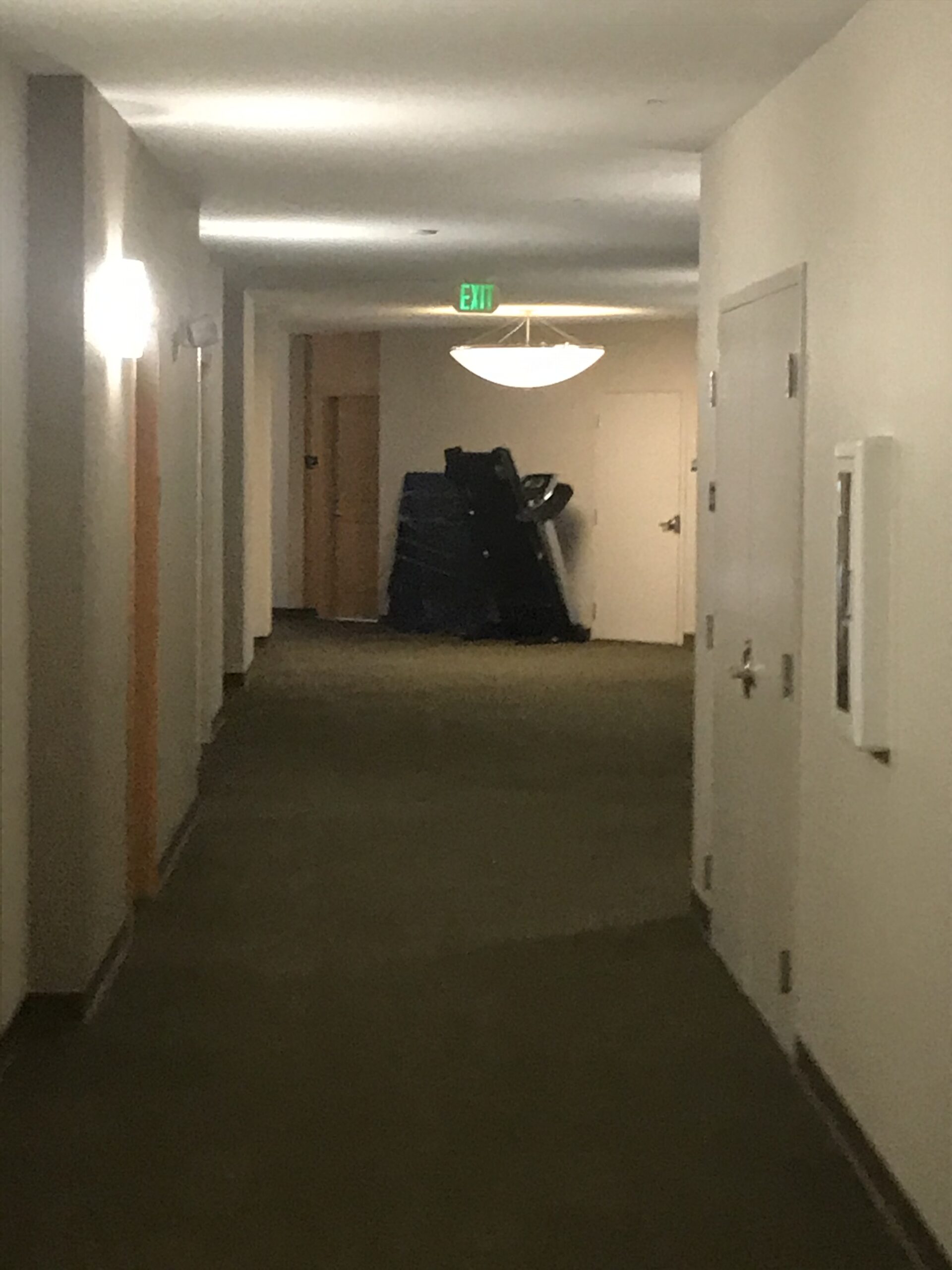 Office corridor with exit sign