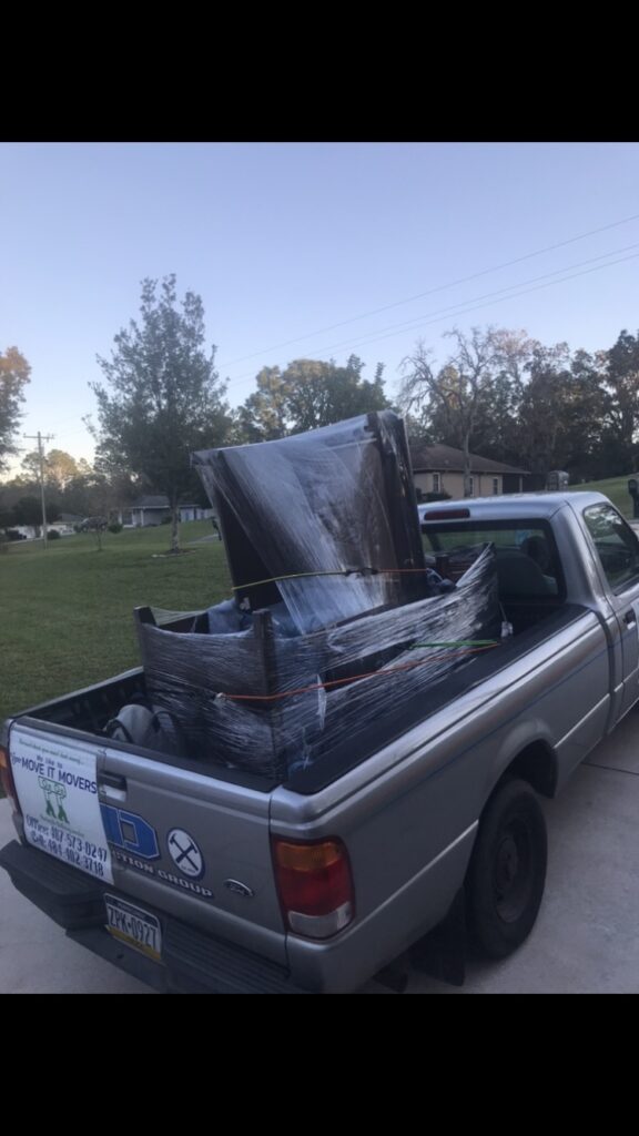 Move It Movers furniture delivery truck
